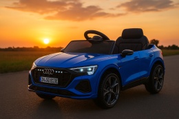 Niebieskie auto na akumulator Audi SQ8 dla dzieci z podświetlanymi światłami LED – efektowny wygląd o zachodzie słońca