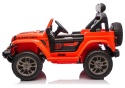 Pomarańczowy Jeep Rubicon na akumulator – widok z boku