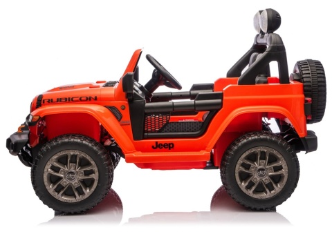 Pomarańczowy Jeep Rubicon na akumulator – widok z boku