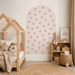 Naklejka na ścianę łuk z różowymi stokrotkami w stylu boho w pokoju dziewczynki
