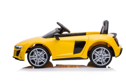 Żółte auto na akumulator Audi R8 dla dzieci widok z boku