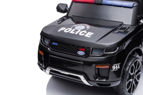 Auto na akumulator policyjne czarne dla dzieci – przód z policyjnymi światłami i grillem