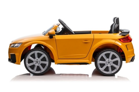 Żółty samochód Audi TT RS na akumulator dla dzieci – widok z boku