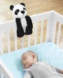 Szumiąca przytulanka Panda Skip Hop przy łóżeczku niemowlęcym